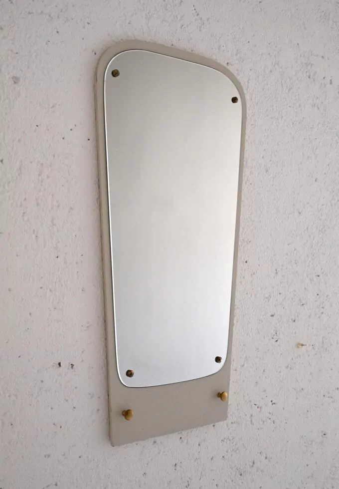 Deco mirror with painted white wooden frame and golden details