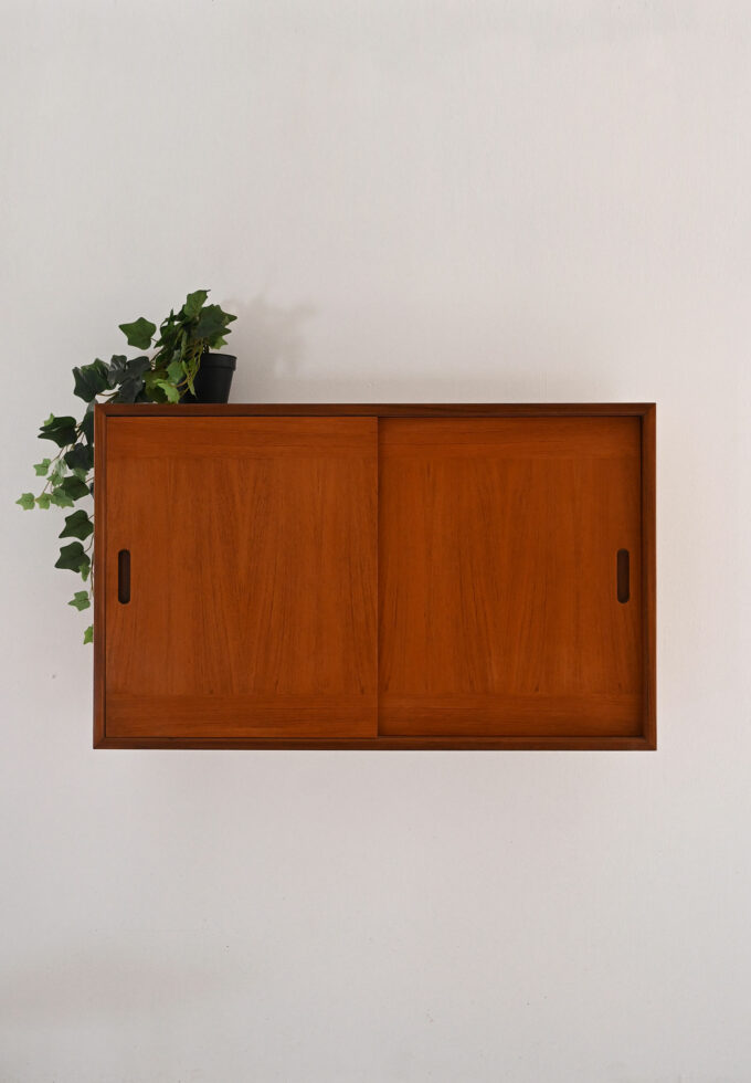 Scandinavian 1960s teak wall cabinet with sliding doors and interior hooks-a
