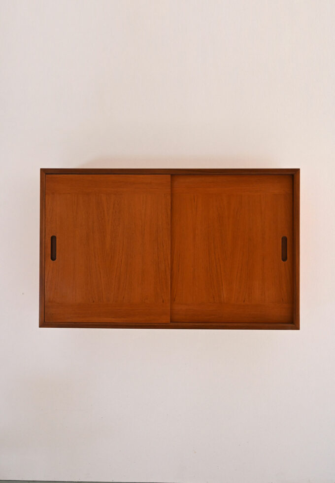 Scandinavian 1960s teak wall cabinet with sliding doors and interior hooks-b