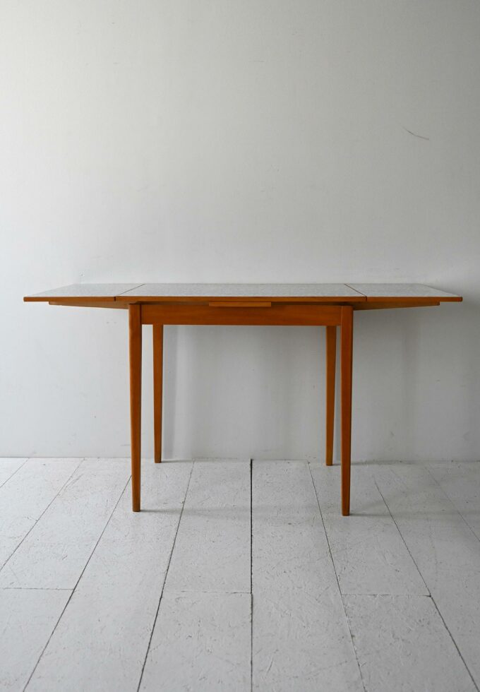 Scandinavian Vintage table by Edsbyverken extendable with formica-b top.