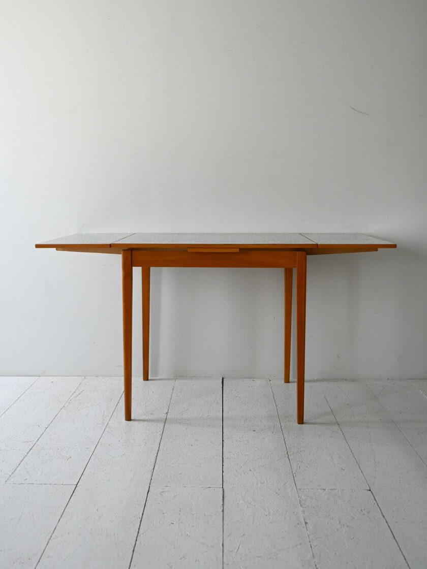 Scandinavian Vintage table by Edsbyverken extendable with formica-b top.
