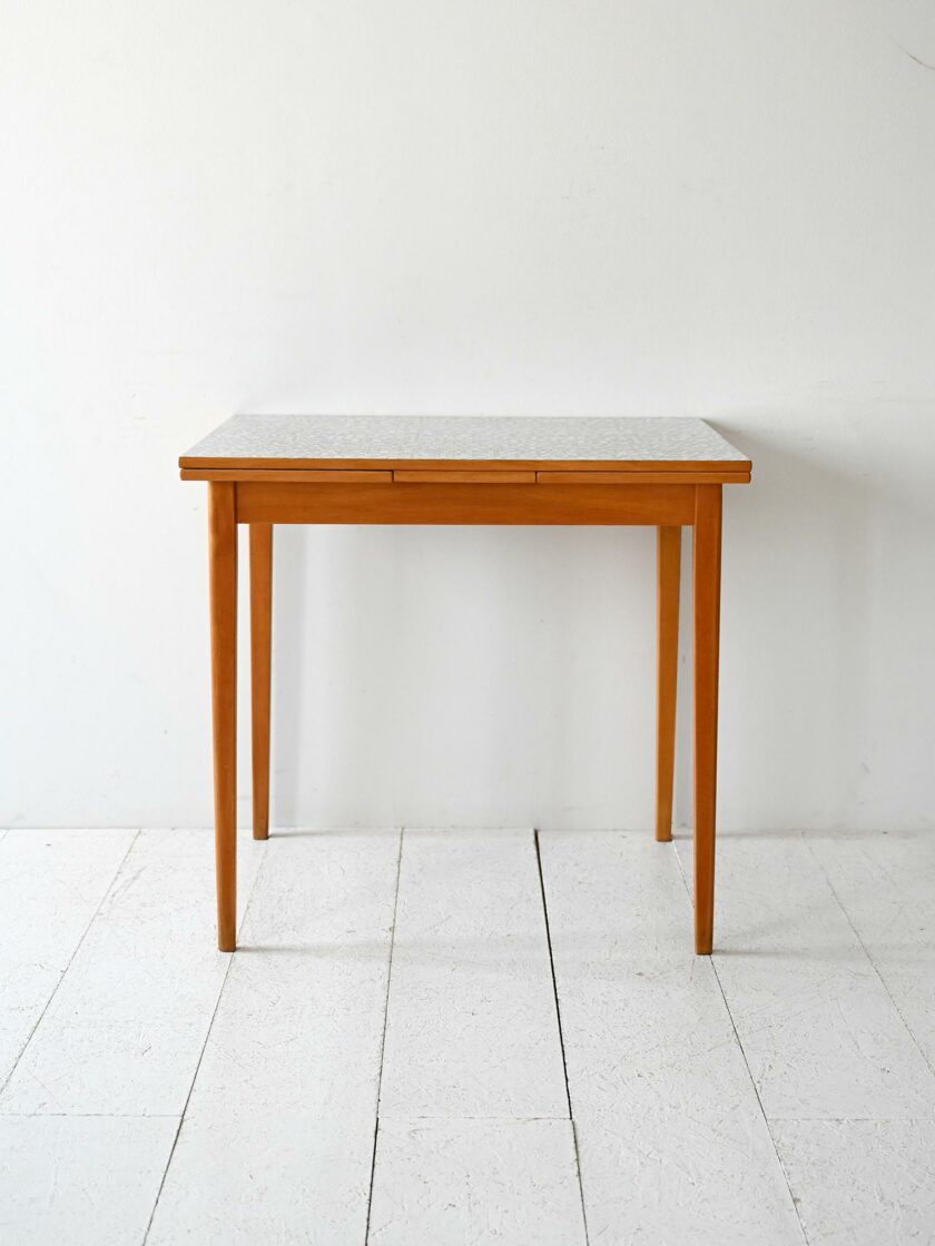 Scandinavian Vintage table by Edsbyverken extendable with formica-d top.