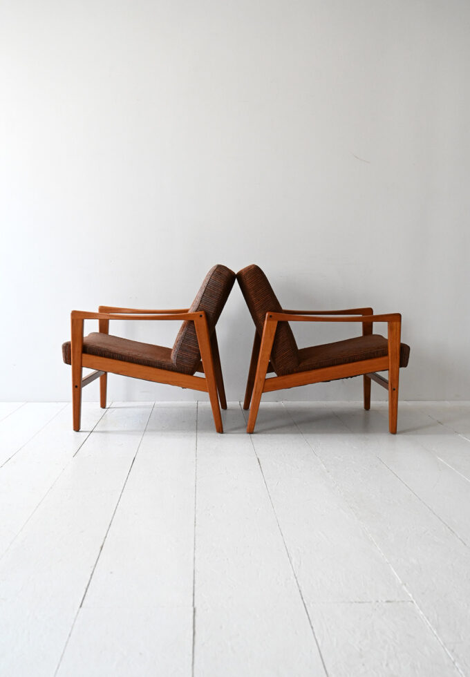 Pair of original vintage Scandinavian teak-d armchairs.