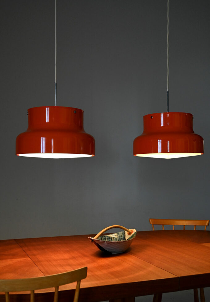 Pair of orange "Bumling" pendant lamps by Anders Pehrson-a