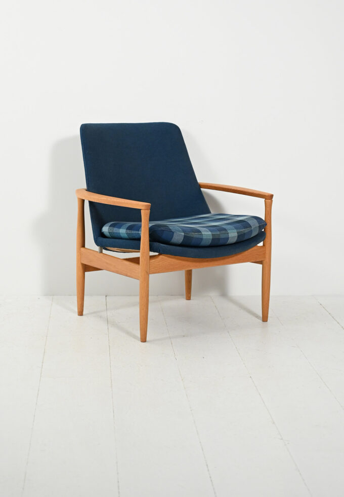 Scandinavian oak and wool blue-b armchair.