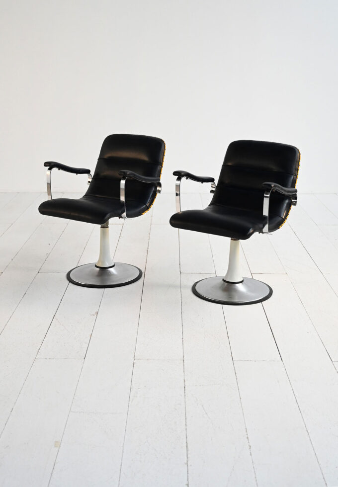 Pair of 1970s swivel armchairs in skai and steel-a
