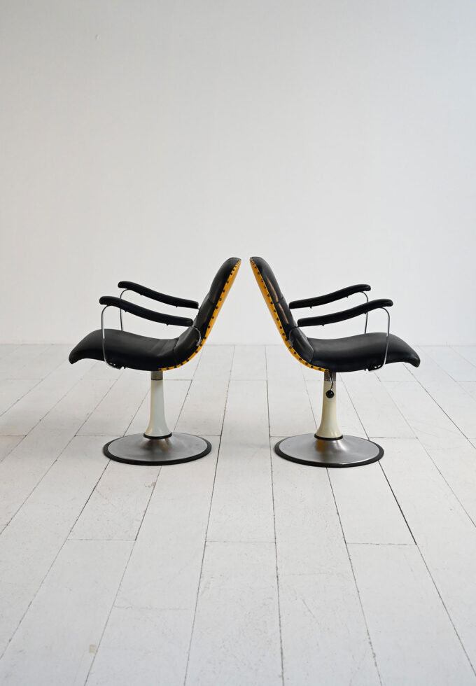 Pair of 1970s swivel armchairs in skai and steel-b