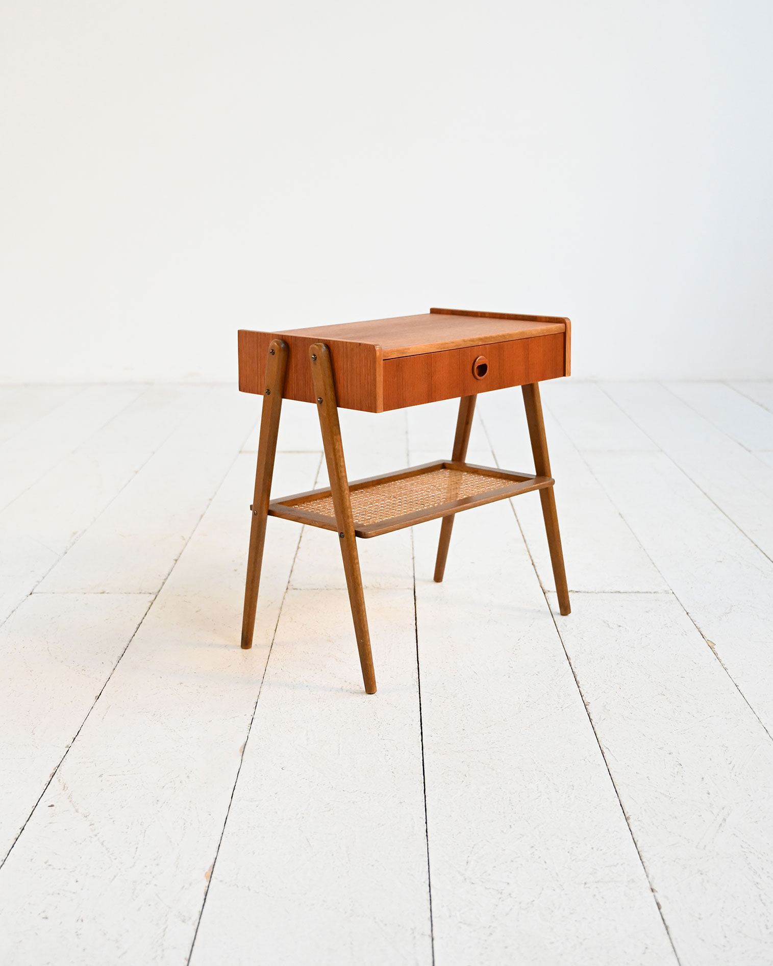 Scandinavian teak bedside table rattan shelf 50s-b Scandinavian teak nightstand with rattan shelf, 1950s-b