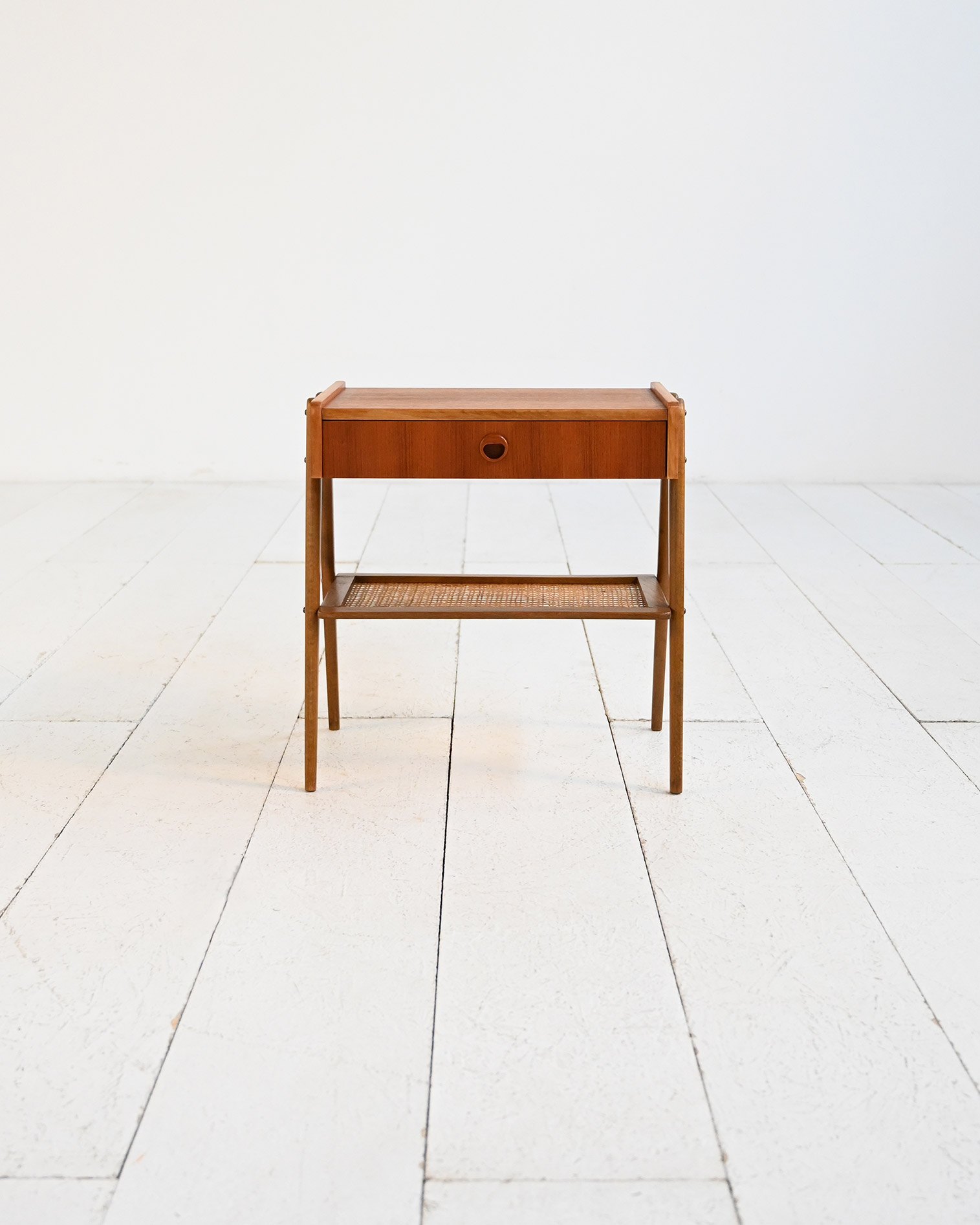 Scandinavian teak bedside table rattan shelf 50s-d Scandinavian teak nightstand with rattan shelf, 1950s-d