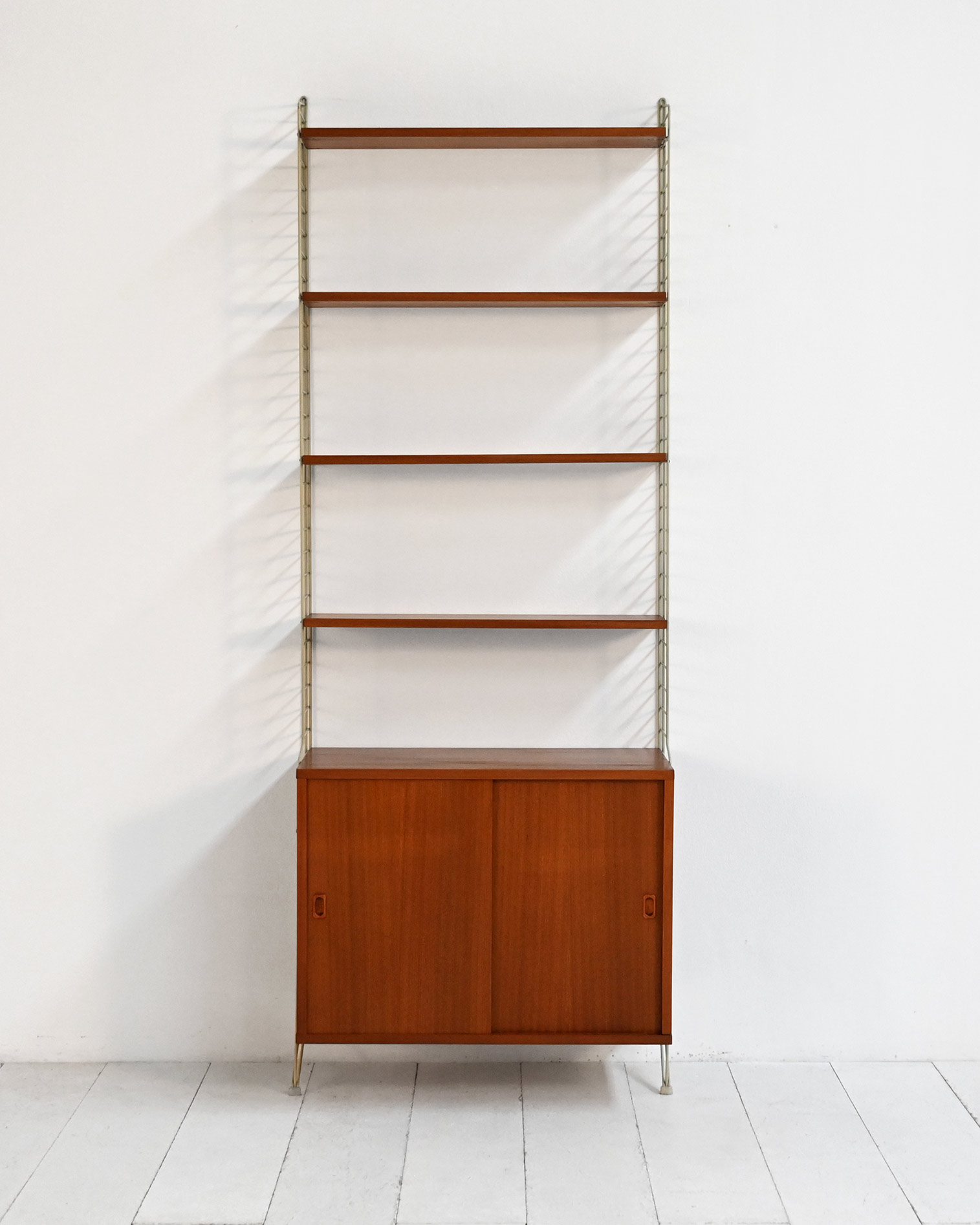 Wall-mounted bookcase model "String" by Nisse Strinning 1950s-60s-a