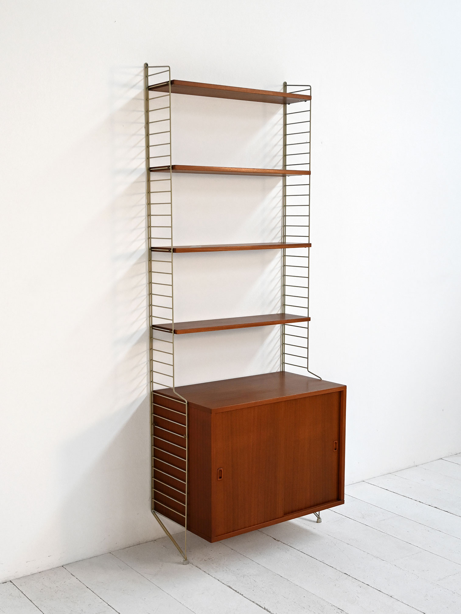 Wall bookcase model "String" Nisse Strinning 50-60s-c Wall-mounted bookcase model "String" by Nisse Strinning 1950s-60s-c
