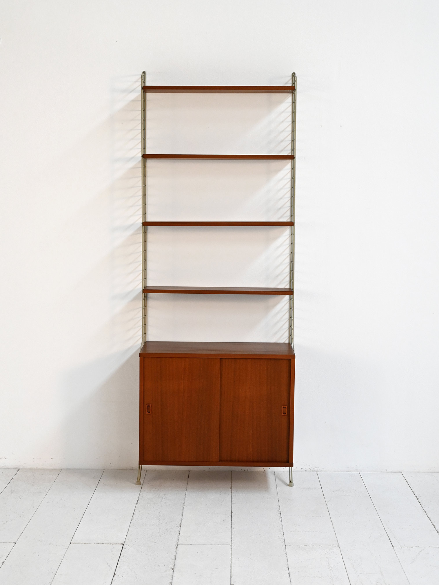 Wall bookcase model "String" Nisse Strinning 50-60s-d Wall-mounted bookcase model "String" by Nisse Strinning 1950s-60s-d