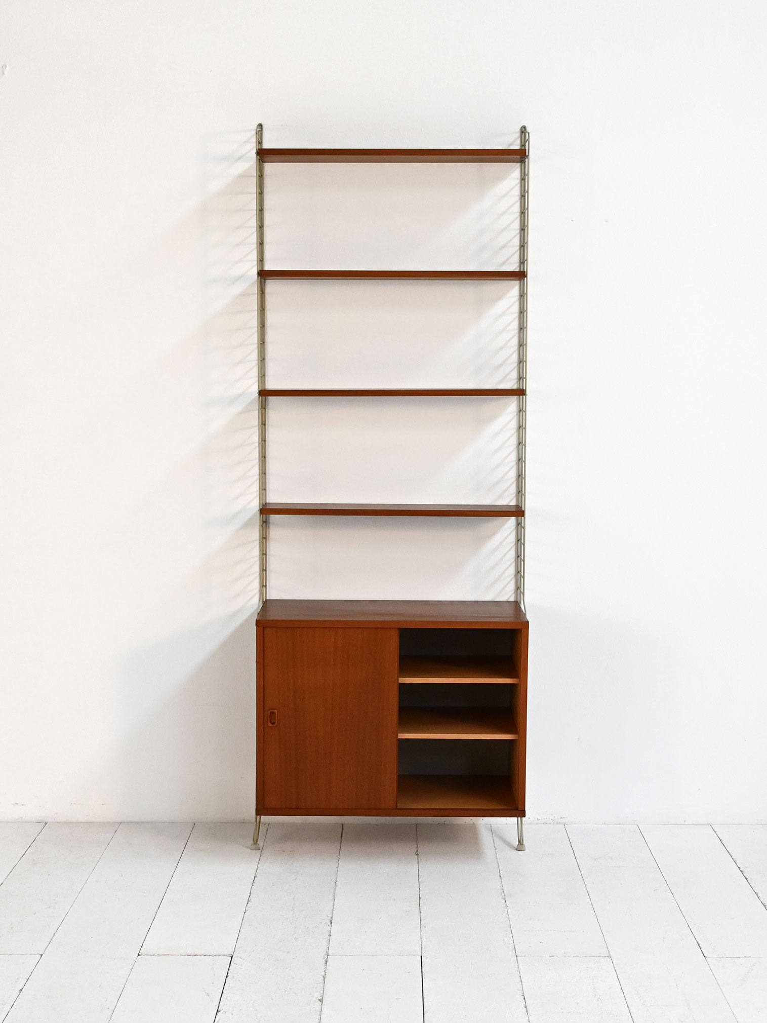 Wall bookcase model "String" Nisse Strinning 50-60s-e Wall-mounted bookcase model "String" by Nisse Strinning 1950s-60s-e