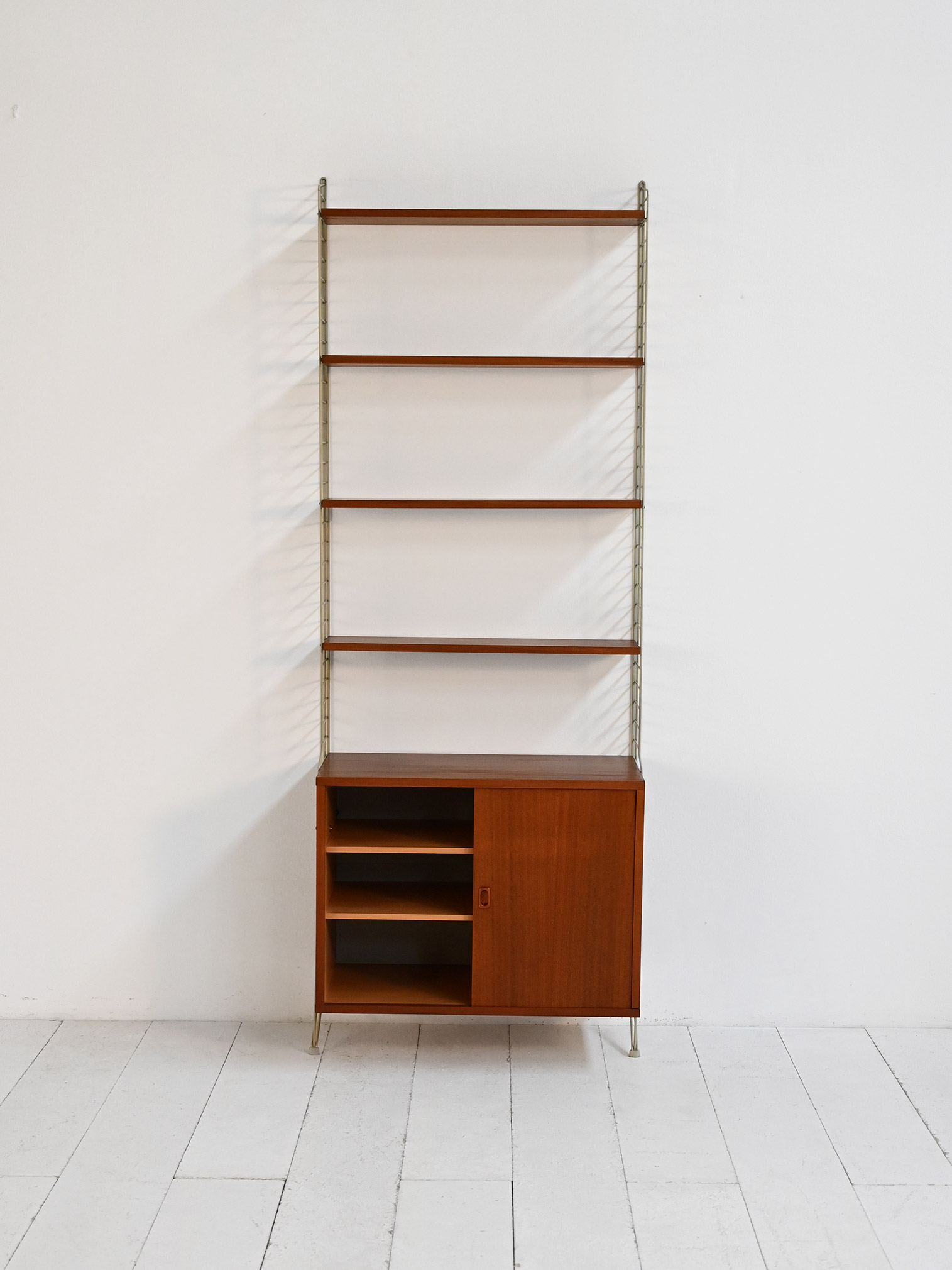 Wall bookcase model "String" Nisse Strinning 50-60s-f Wall-mounted bookcase model "String" by Nisse Strinning 1950s-60s-f
