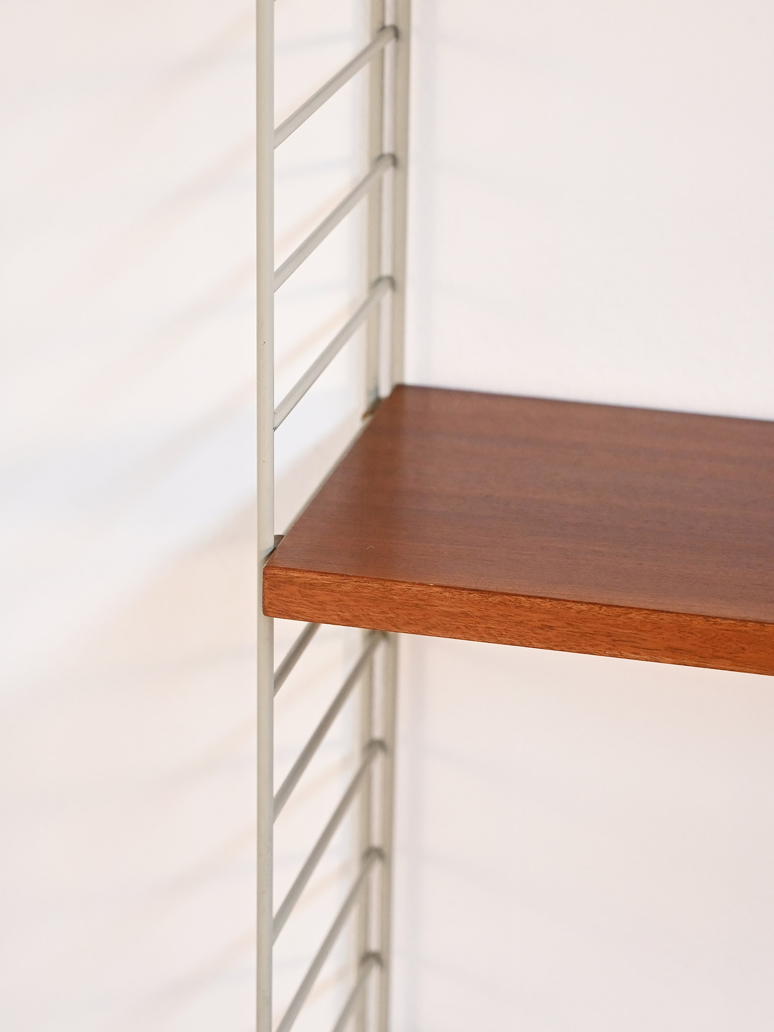 Wall bookcase model "String" Nisse Strinning 50-60s-i Wall-mounted bookcase model "String" by Nisse Strinning 1950s-60s-i